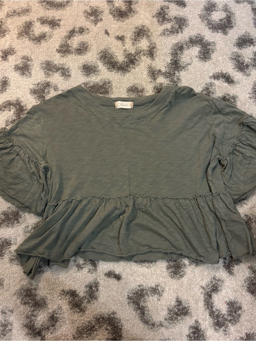 • green peplum top •
